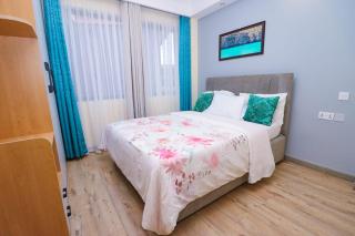 celestial two bedroom apartment with heated swimming pool fully equipped gym ample parking space children playing ground and a relaxing rooftop with amazing scenic views - 3