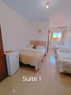 Camelo locação de Suítes Individuais Pousada com Cozinha e Sala Compartilhada - 3