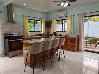 AJ House - Spacious 4BR Home, Balcony, BBQ area, Shared Pool - 8