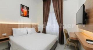 Moresto Hotel Mitra RedDoorz - 9