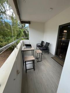 Nayuha Apt A1 - 3 bed rooms - Reach for the beach, across the road - 4