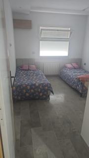 A one-bedroom apartment with a living room, kitchen, and balcony - 4