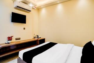 Super Townhouse Bhangagarh Bus Terminal Formerly The Rudra Inn - 9