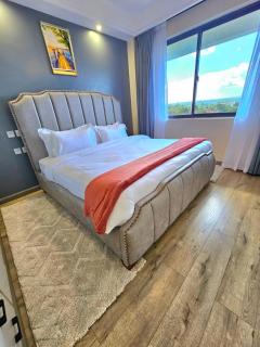 modern living two bedroom apartment with heated swimming pool well equipped gym ample parking space children playing ground and a relaxing rooftop with breathtaking scenic views - 4