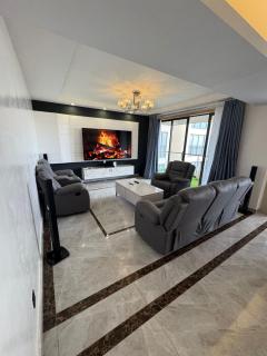 Urban Oasis Four Bedroom Furnished Home - 0