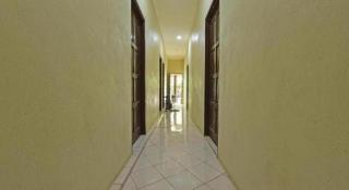 OYO 90596 Casaria Inn - 1