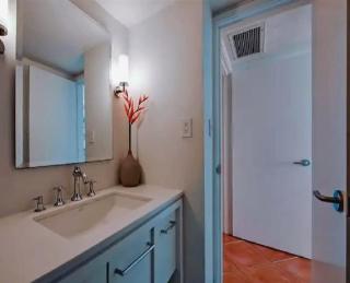 Bright Two-Bedroom Oceanfront Condo With Balcony and Coastal Views - 1