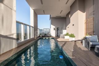 Shop del Sol Luxury 2 BR Apt w Resto, Pool & Gym - 8