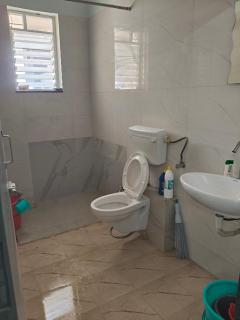 1 big furnished studio apartment with a pantry including fridge, utensils, gas stove and a washing machine with attached bathroom that can accommodate minimum 4 people - 5