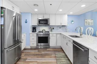 Ocean Front 1 Bedroom Rainbow Condo, Steps to the Beach! - 1