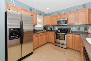 Steps to the boardwalk, Check out this 4 Bedroom Townhome with Outdoor Pool! - 0