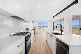 Beach Escape with Heated Pool and Coastal Comfort - 9