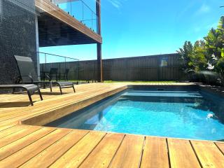 Beach Escape with Heated Pool and Coastal Comfort - 6