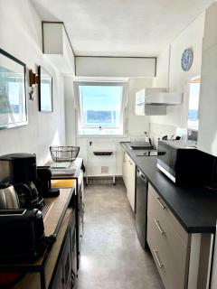 Appartement SUPERBE VUE MER avec terrasse-véranda, WIFI, à TREGASTEL - Réf 90 - 1