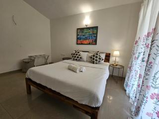 Serene 2BHK Porvorim Apartment with Forest View & Pool Access - 1