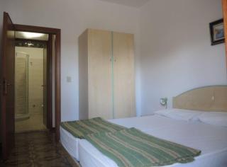 Family apartment steps from Pluto Beach - 5