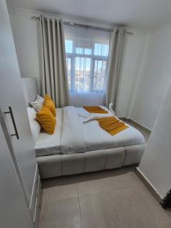 CM Snug stay -Naivegas Apartments - 3