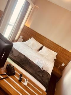 Flat S4 Andar alto cama Queen - 1