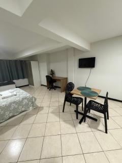 Studio amplo e aconchegante no bairro aterrado - 1