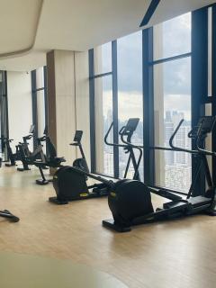 Axon Suites near at Pavilion with Rooftop Panoramic City View - 1