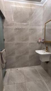 Elegant studio with 65-inch screen and outdoor seating - 8