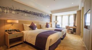 Sky World Hotel Qingdao - 9