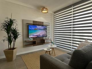 Departamento con piscina con orientación oriente cercano a playa El Faro - 0