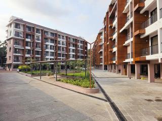 Beige 1BHK Apartment in Candolim with Pool, Gym and Family Friendly Amenities - 9