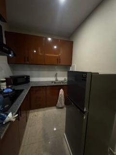 Cozy 2BHK Apartment in Bahria Self Check-in, Balcony, PS4 & Projector - 8