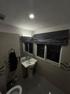 Cozy 2BHK Apartment in Bahria Self Check-in, Balcony, PS4 & Projector - 3