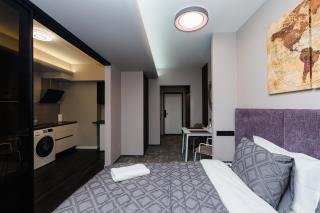 Luxury Airport Studio with Balcony Cozy & Modern - 4