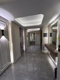 Elegant Three-Bedroom Apartment in Mohandessin - 8