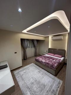 Elegant Three-Bedroom Apartment in Mohandessin - 2