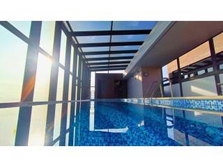 Penthouse in Zona T with Rooftop Pool, Sauna & Gym - 9