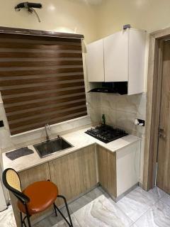 Unwind in style 2-bedroom shortlet, ps5, pool,gym - 9