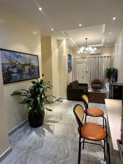 Unwind in style 2-bedroom shortlet, ps5, pool,gym - 8