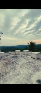 A CLASS King bedroom with balcony view, extra bed, and a spacious bathroom with changing area - 2