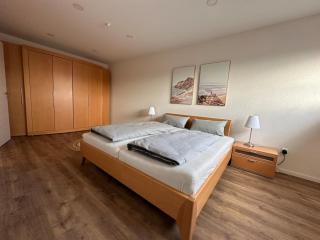 Neue helle 4 Zimmerwohnung mit Tiefgaragenparkplatz - 9