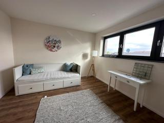 Neue helle 4 Zimmerwohnung mit Tiefgaragenparkplatz - 8