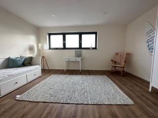 Neue helle 4 Zimmerwohnung mit Tiefgaragenparkplatz - 2