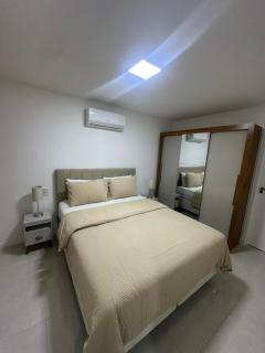 Apartamento com Piscina, Academia e 2 min da praia - 1