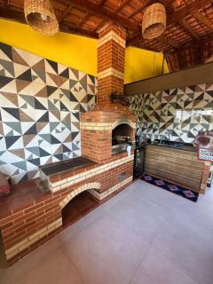 50 metros da praia,Ar condicionado na sala de estar e suíte, Área Gourmet - Serra - 7