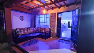 Urban Garden Hideaway Serene one-bedroom retreat with a private garden & chill veranda, 30 Minutes from JKIA - 0