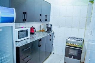 Stay and Dine, 2Bedroom Home at Mama Pizzalo - 1