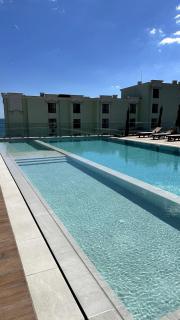 Modern 1-bed with pool & seaview - 1