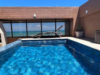 Cobertura com piscina privativa e vista para o mar - 9