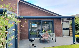 Luxe zomerwoning met omheinde tuin voor hond en kinderen - Dirkshorn - 9