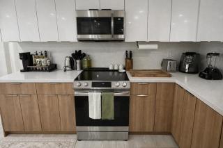 Sunny Oasis Near the Beach with 4BR and 3BA Pool Home - 1