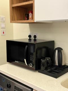 Comfort Hotel الراحة للشقق الفندقية - 6