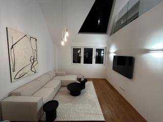 Spacious and Stylish Two-Level Retreat - 7